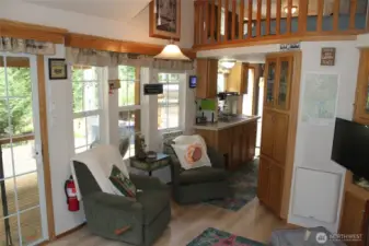 More living room but facing the quaint kitchen. All appliances stay.