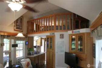 Another view of the kitchen from the living room. All appliances stay. New range and microwave.