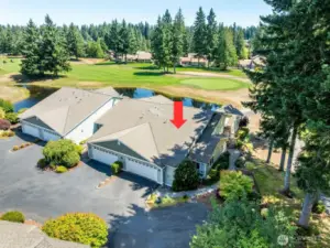 Rare find! A one-level end unit, pristine condo on the golf course.