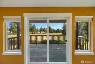 Sliding glass doors lead to the view deck off the living area.