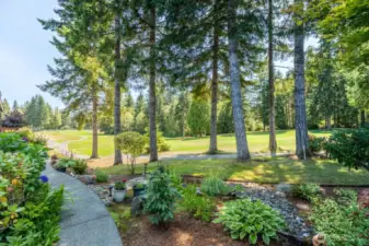 Unique to this condo is a lovely, quiet side yard.