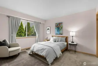 Quiet and comfortable rooms with easy access to the lower-level living area. ( Virtually Staged )