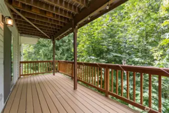 Your outdoor sanctuary. The patio is the perfect spot for morning coffee or evening stargazing, all while enjoying the peaceful greenbelt view.