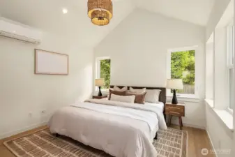 Primary suite with vaulted ceilings