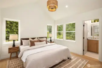 Primary suite with vaulted ceilings