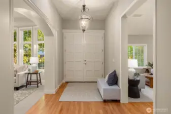 Welcoming foyer separates the two living spaces.