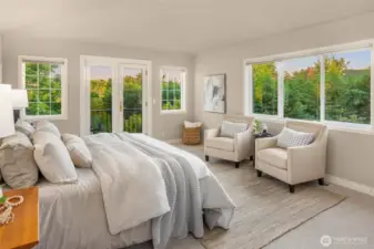 Lovely primary suite is light and bright with views of the mountain. A nice private retreat at the end of the upper level hallway.