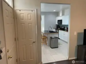 Kitchen entry to left of living room.