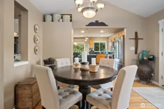 Dining area between formal living room and kitchen.