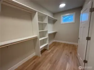 Primary closet with built in organizer