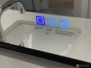 Touch controls on mirrors in Primary bathroom