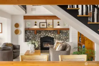 The interior propane fireplace is flanked by two window seats. The hearth has radiant heat, creating an extra cozy space to curl up and read a book.