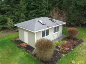 Detached shop with roll up door