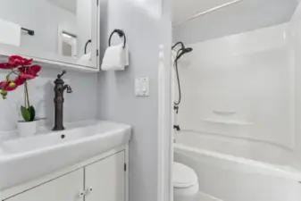 Bathroom with soaking tub.