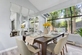 Dining room with large windows.