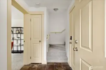 You're greeted by a slate entry off of the attached 1 car garage. Main floor walk-out bedroom connects to the patio (also accessed outside with a gate) with en-suite bathroom