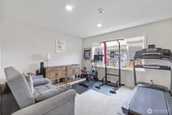 Upstairs bonus area / gym or extra TV room