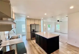Living and dining room flow into kitchen