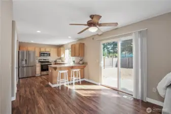 The area off of the kitchen could be another place to put a table if you want to use the dining area for an office area.