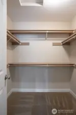 Walk-in closet for third bedroom.