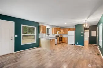 Entrance into open concept Kitchen, dining, living room