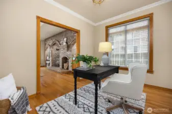 Den office off family room with hardwood floors and French doors