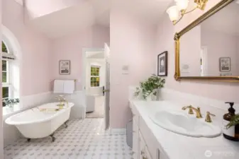 Hall bath with access from bedroom 2 and hallway.