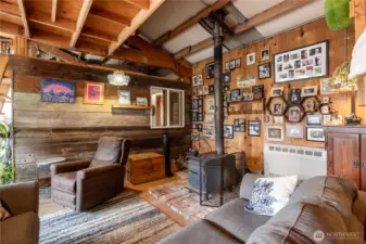 wood-burning stove over hand-laid hearth of sustainably sourced, recycled brick