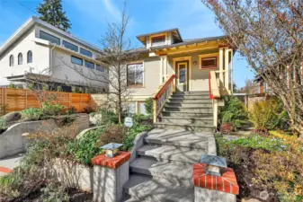 Gorgeous restored craftsman with very nice exterior concrete work.