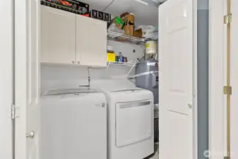 Laundry room with storage cabinets