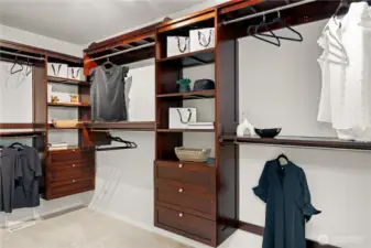 Walk-in closet is built-out for all your storage needs.