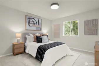 Upper level bedroom. This is one of four bedrooms upstairs in the home.