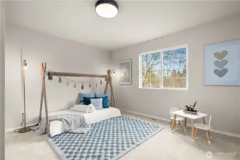 Upper level bedroom. This is one of four bedrooms upstairs in the home.