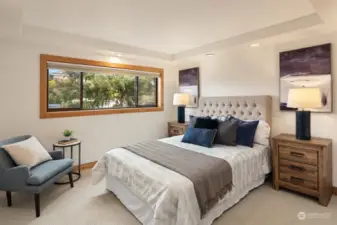 Sizeable guest bedroom comes in at just about 165sqft and feels even bigger with the coved ceilings, abundant lighting and views looking up towards the top of Queen Anne Hill.
