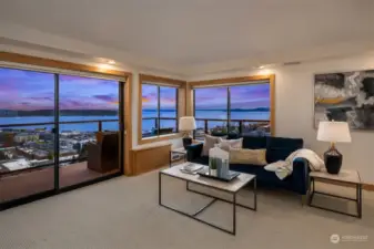 Could you picture yourself coming home after a long day to relax and watch the sun set over Elliot Bay?