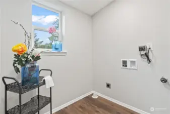 Laundry Room w/Laminate Floors. Septic Alarm setup.