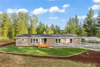 NEW: Roof, Windows, Paint, Deck, Sod, Bark, Carport, Gravel Driveway.