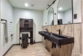 Primary attached bath with tile accents.