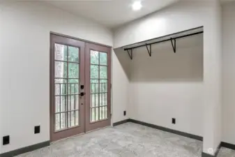 Bedroom 1 with beautiful forest views.