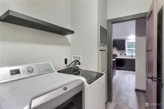 Laundry room with included washer and dryer.