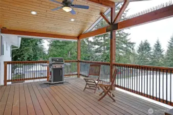 Large covered deck right off of the dining room is the perfect place to entertain friends and family or enjoy warm Summer evenings relaxing. Also offers easy access to massive detached shop.