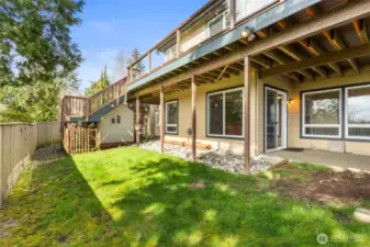 The fenced back yard provides opportunities for fun and play.
