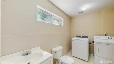 Lower Level Powder Room & Utility Room