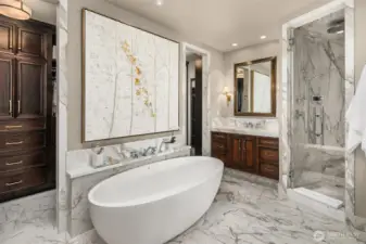 The epitome of lavish luxury with no expense spared. This primary 5 pc spa bath is replete with a large walk in steam shower, jetted MTI soaking tub and 2 dual vanities. Perfection realized!