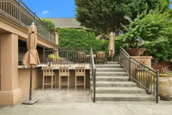 An entertainment bar off of the outdoor kitchen and one of several venues for the best in al fresco living.