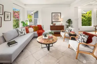 The living room is full of light and is large and lovely! Gorgeous sliding doors between the front foyer and this sumptuous room! The windows in this home are absolutely stunning and have been upgraded throughout!