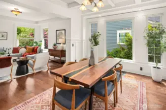 Another view of the living room and dining room that are adjacent to your stunning kitchen!