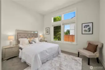 Main-floor bedroom/den with adjacent full bath