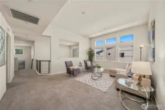 Versatile upstairs loft – perfect for a home office, media room, or play area