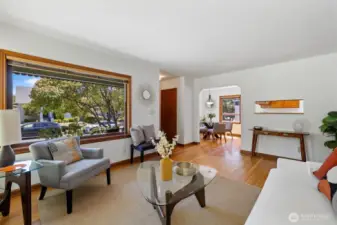 Another view of the living room, looking toward the dining room and kitchen.
